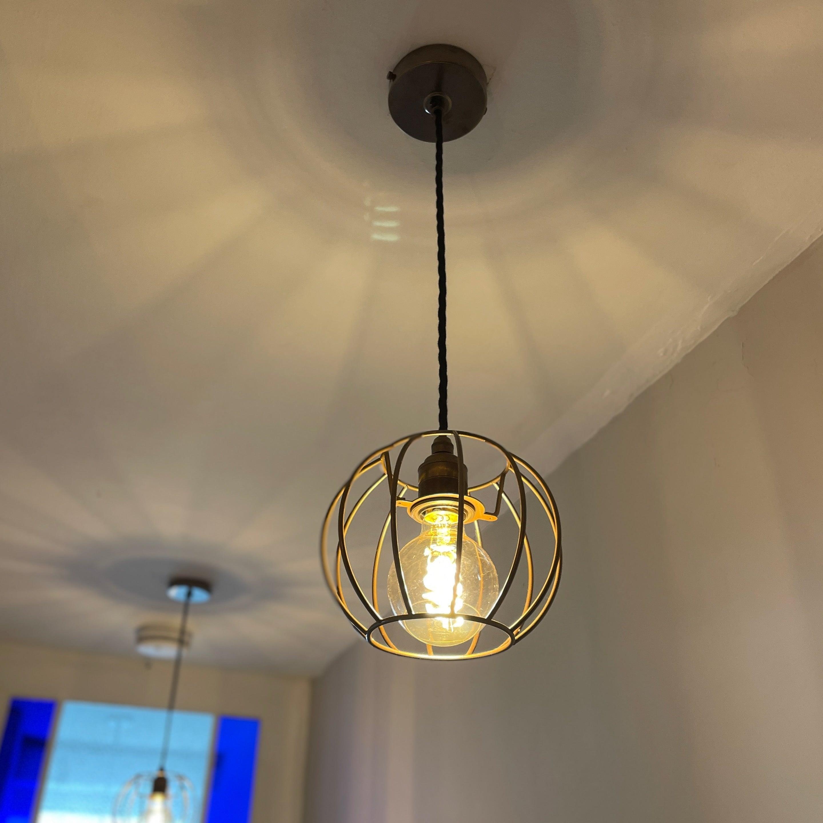 Brass Pendant Lights with Warm Amber Glass